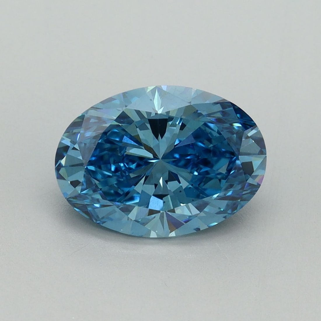 Loose Diamond - OVAL 2.19ct Fancy Vivid Blue VS2: Loose Diamond - OVAL 2.19ct Fancy Vivid Blue VS2 Source: This is a real non-mined Diamond that has been grown in a lab Shape: OVAL Carats: 2.19 Color: Fancy Vivid Blue Certification: IGI Video: