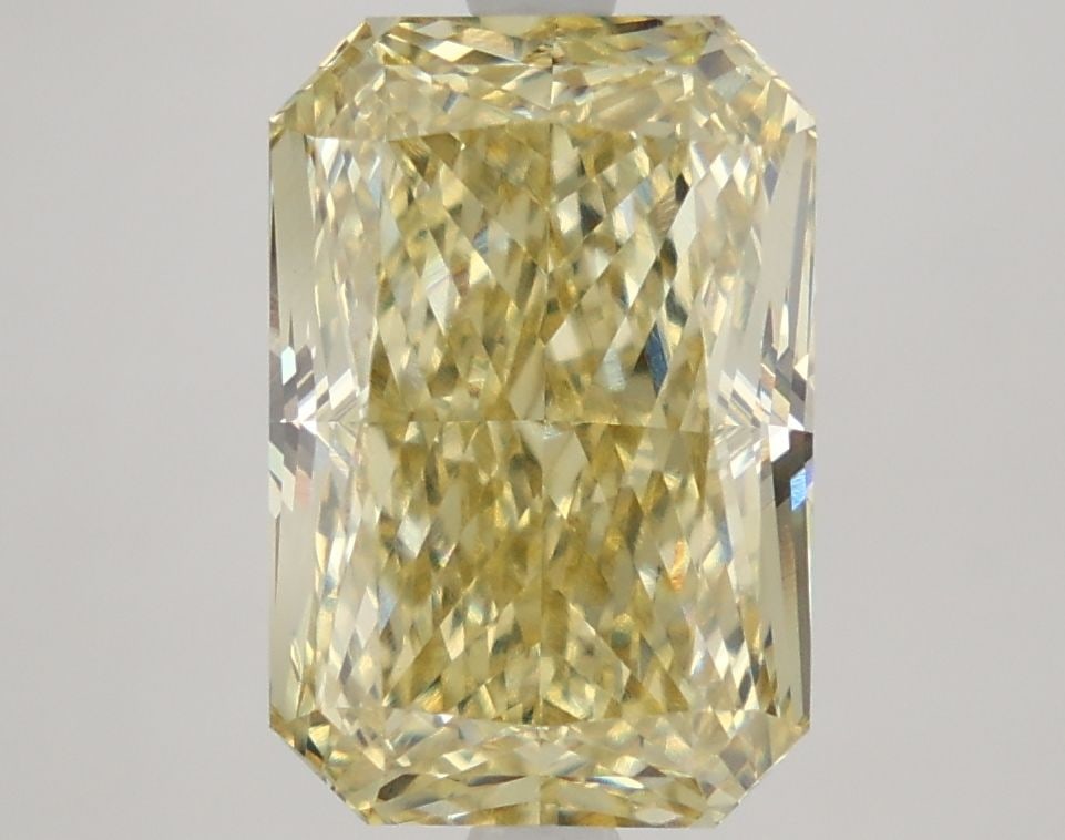 Loose Diamond - RADIANT 4.56ct Fancy Yellow VVS2: Loose Diamond - RADIANT 4.56ct Fancy Yellow VVS2 Source: This is a real non-mined Diamond that has been grown in a lab Shape: RADIANT Carats: 4.56 Color: Fancy Yellow Certification: IGI Video: