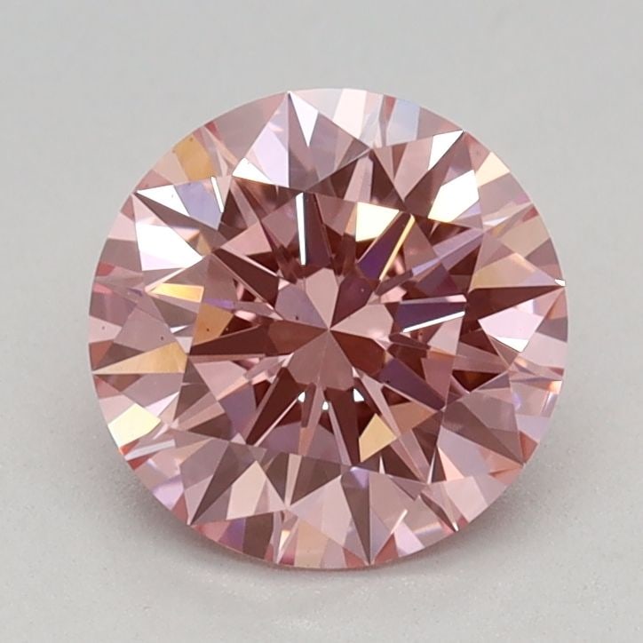 Ideal Loose Diamond - ROUND 0.95ct Fancy Vivid Pink VS2: Ideal Loose Diamond - ROUND 0.95ct Fancy Vivid Pink VS2 Source: This is a real non-mined Diamond that has been grown in a lab Shape: ROUND Carats: 0.95 Color: Fancy Vivid Pink Certification: IGI Video