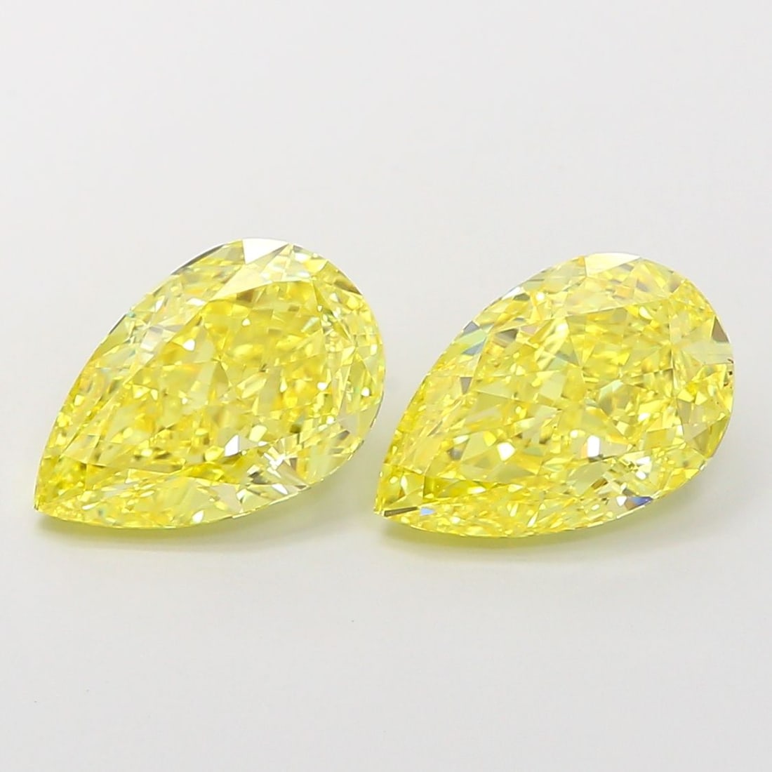 Loose Diamond - PEAR 2.57ct Fancy Vivid Yellow VS1: Loose Diamond - PEAR 2.57ct Fancy Vivid Yellow VS1 Source: This is a real non-mined Diamond that has been grown in a lab Shape: PEAR Carats: 2.57 Color: Fancy Vivid Yellow Certification: IGI Video: