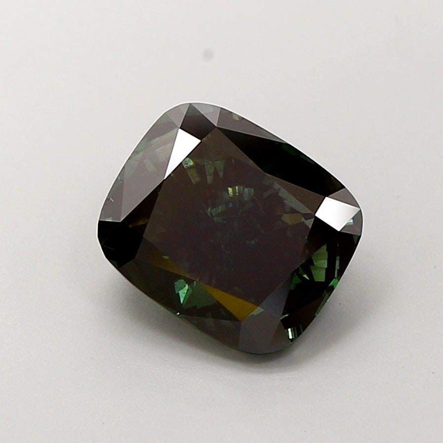Loose Diamond - CUSHION MODIFIED 3.01ct Fancy Deep Green SI1: Loose Diamond - CUSHION MODIFIED 3.01ct Fancy Deep Green SI1 Source: This is a real non-mined Diamond that has been grown in a lab Shape: CUSHION MODIFIED Carats: 3.01 Color: Fancy Deep Green Certific