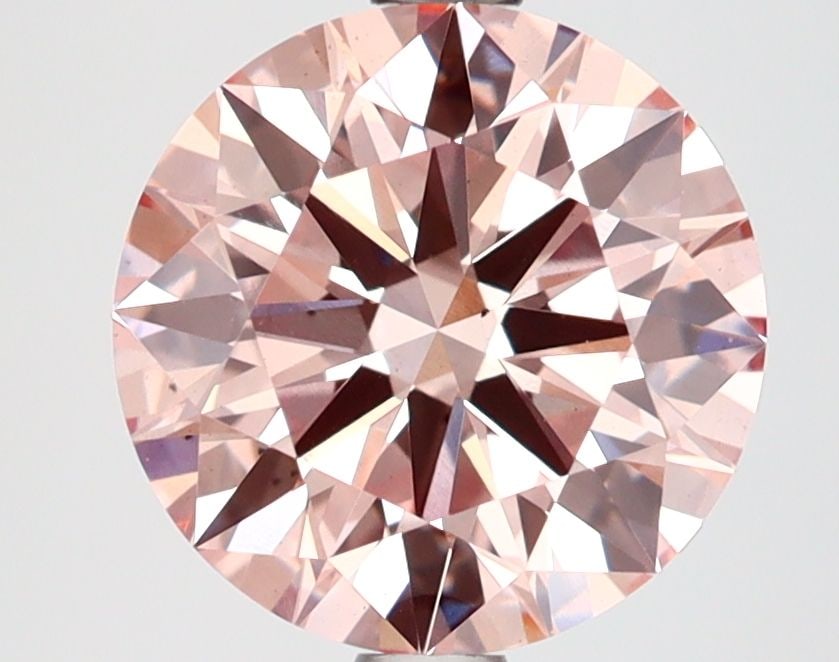 Ideal Loose Diamond - ROUND 2.65ct Fancy Pink VS1: Ideal Loose Diamond - ROUND 2.65ct Fancy Pink VS1 Source: This is a real non-mined Diamond that has been grown in a lab Shape: ROUND Carats: 2.65 Color: Fancy Pink Certification: IGI Video:
