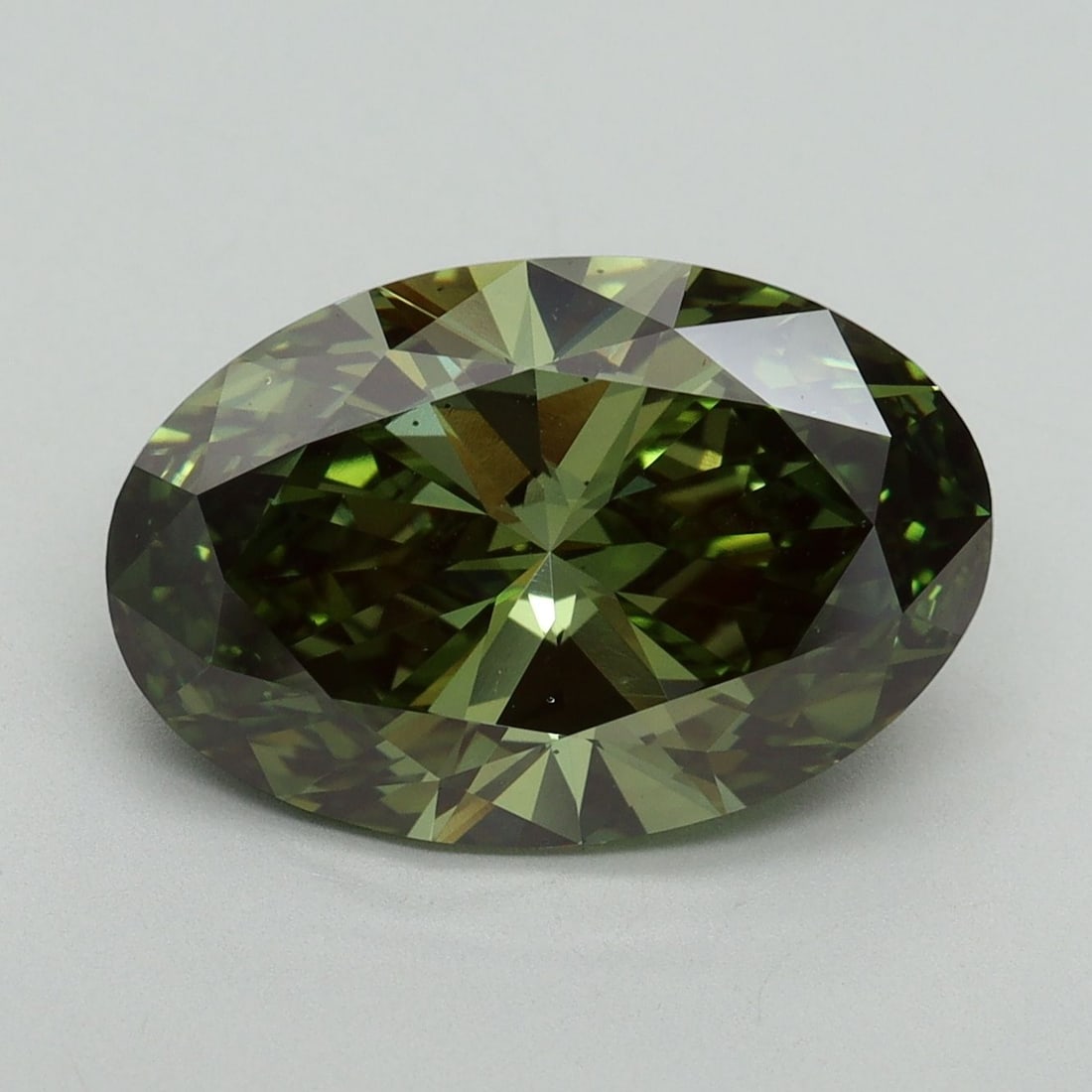 Loose Diamond - OVAL 5.01ct Fancy Vivid Green VS2: Loose Diamond - OVAL 5.01ct Fancy Vivid Green VS2 Source: This is a real non-mined Diamond that has been grown in a lab Shape: OVAL Carats: 5.01 Color: Fancy Vivid Green Certification: IGI Video: