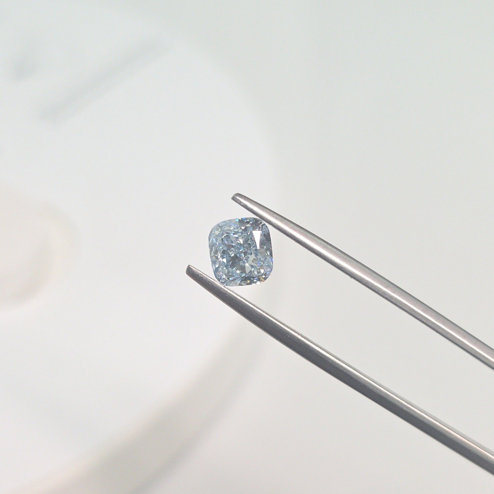 Loose Diamond - CUSHION MODIFIED 1.13ct Fancy Blue VS1: Loose Diamond - CUSHION MODIFIED 1.13ct Fancy Blue VS1 Source: This is a real non-mined Diamond that has been grown in a lab Shape: CUSHION MODIFIED Carats: 1.13 Color: Fancy Blue Certification: IGI V