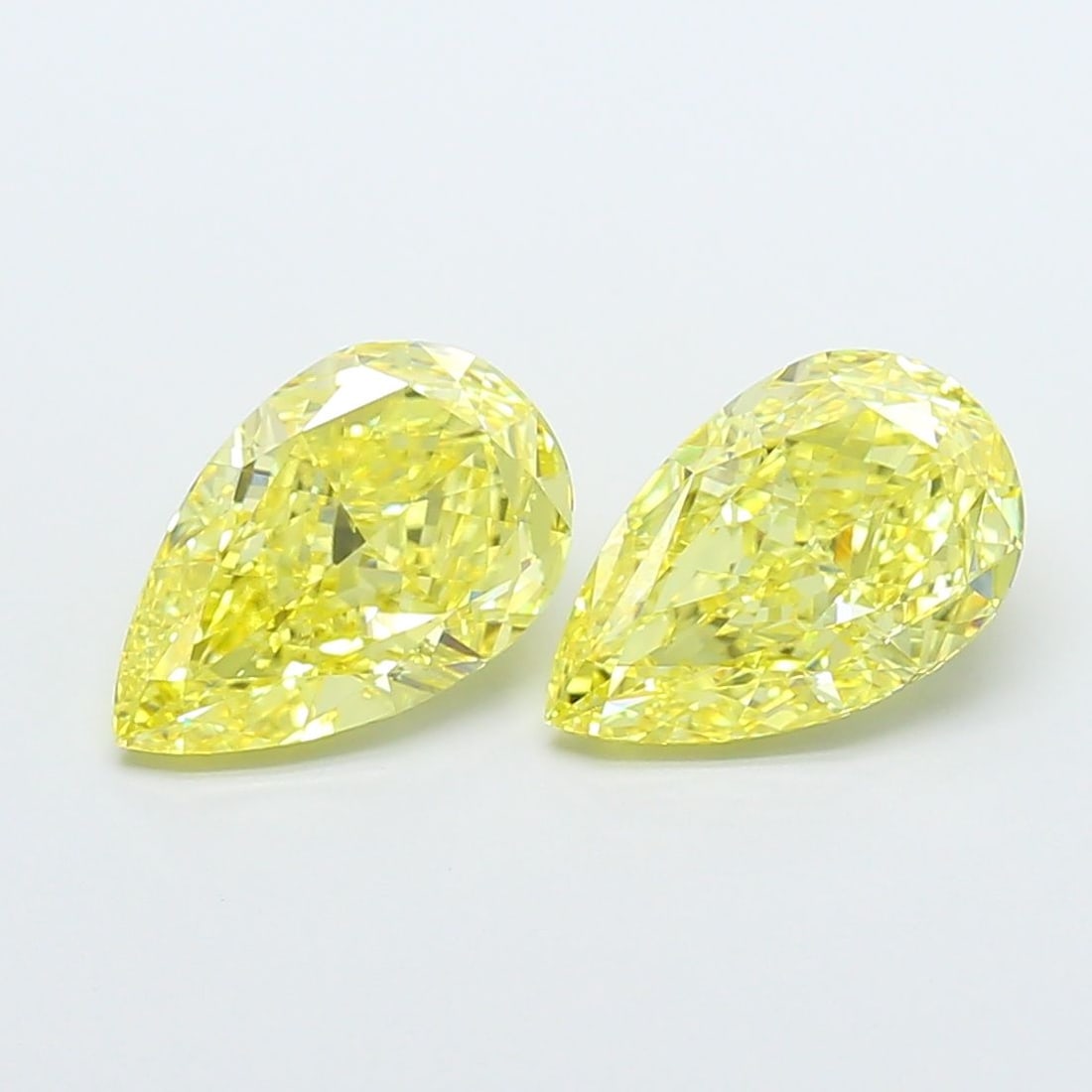 Loose Diamond - PEAR 3.02ct Fancy Vivid Yellow VVS2: Loose Diamond - PEAR 3.02ct Fancy Vivid Yellow VVS2 Source: This is a real non-mined Diamond that has been grown in a lab Shape: PEAR Carats: 3.02 Color: Fancy Vivid Yellow Certification: IGI Video: