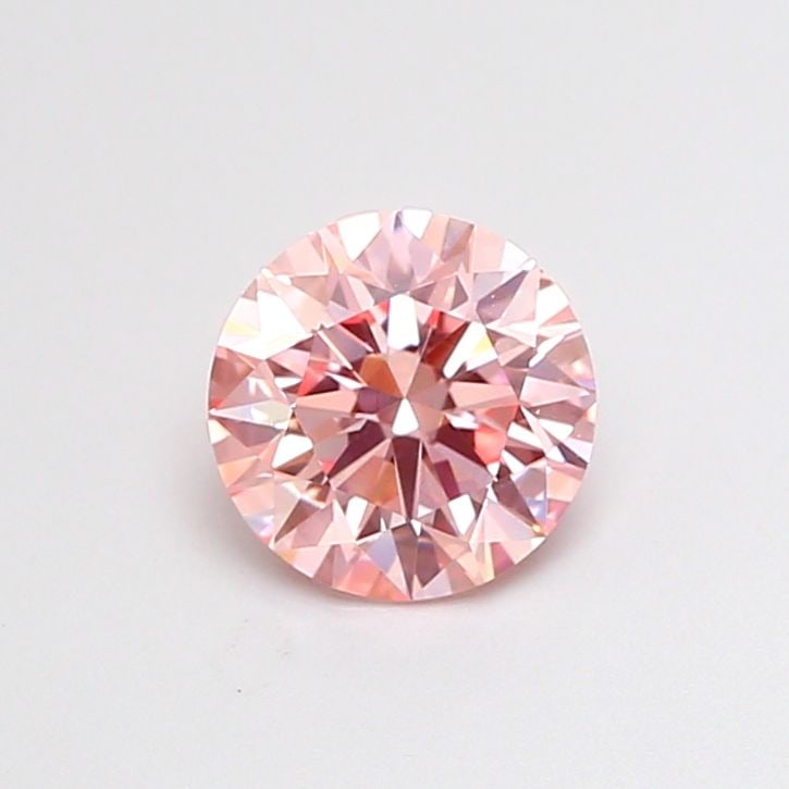 Loose Diamond - ROUND 1.07ct Fancy Intense Pink VVS2: Loose Diamond - ROUND 1.07ct Fancy Intense Pink VVS2 Source: This is a real non-mined Diamond that has been grown in a lab Shape: ROUND Carats: 1.07 Color: Fancy Intense Pink Certification: IGI Video:
