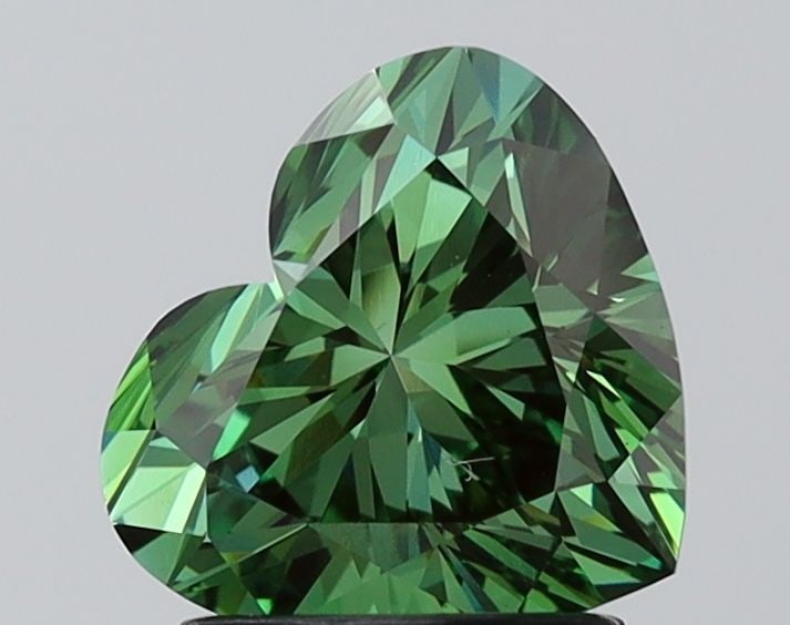 Loose Diamond - HEART 1.73ct Fancy Vivid Green VS1: Loose Diamond - HEART 1.73ct Fancy Vivid Green VS1 Source: This is a real non-mined Diamond that has been grown in a lab Shape: HEART Carats: 1.73 Color: Fancy Vivid Green Certification: IGI Video: