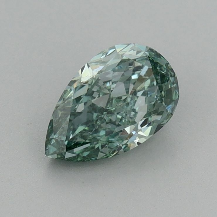Loose Diamond - PEAR 0.74ct Fancy Vivid Green VVS2: Loose Diamond - PEAR 0.74ct Fancy Vivid Green VVS2 Source: This is a real non-mined Diamond that has been grown in a lab Shape: PEAR Carats: 0.74 Color: Fancy Vivid Green Certification: IGI Video: