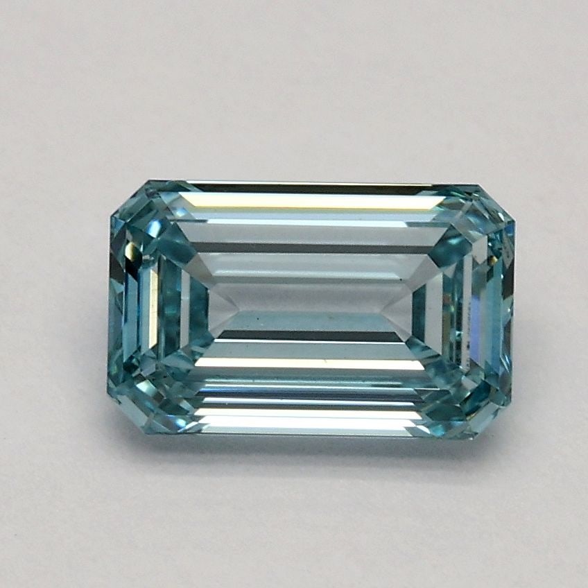 Loose Diamond - EMERALD 0.91ct Fancy Intense Greenish Blue VS1: Loose Diamond - EMERALD 0.91ct Fancy Intense Greenish Blue VS1 Source: This is a real non-mined Diamond that has been grown in a lab Shape: EMERALD Carats: 0.91 Color: Fancy Intense Greenish Blue Cert