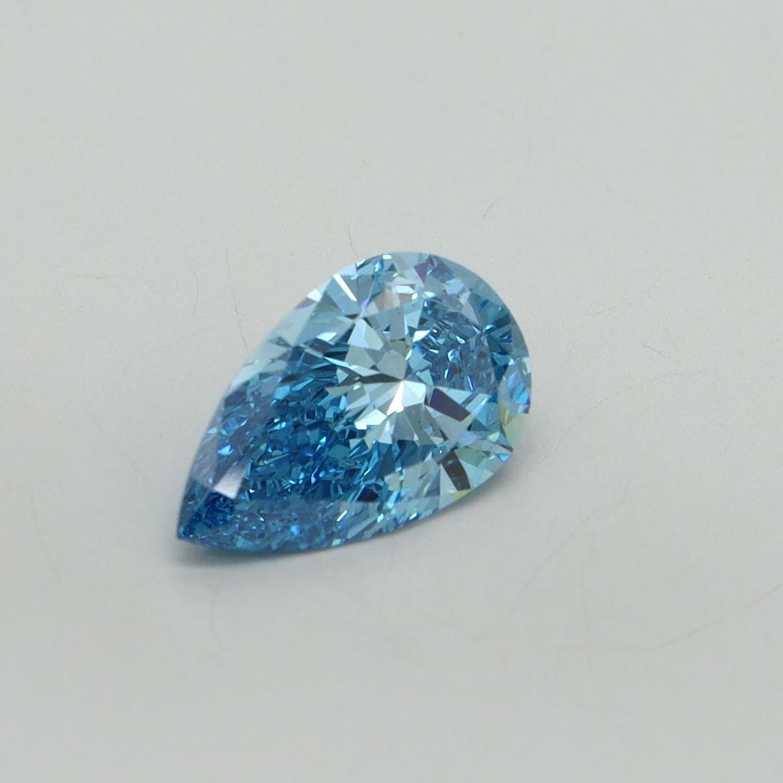 Loose Diamond - PEAR 1.02ct Fancy Vivid Blue VS2: Loose Diamond - PEAR 1.02ct Fancy Vivid Blue VS2 Source: This is a real non-mined Diamond that has been grown in a lab Shape: PEAR Carats: 1.02 Color: Fancy Vivid Blue Certification: IGI Video:
