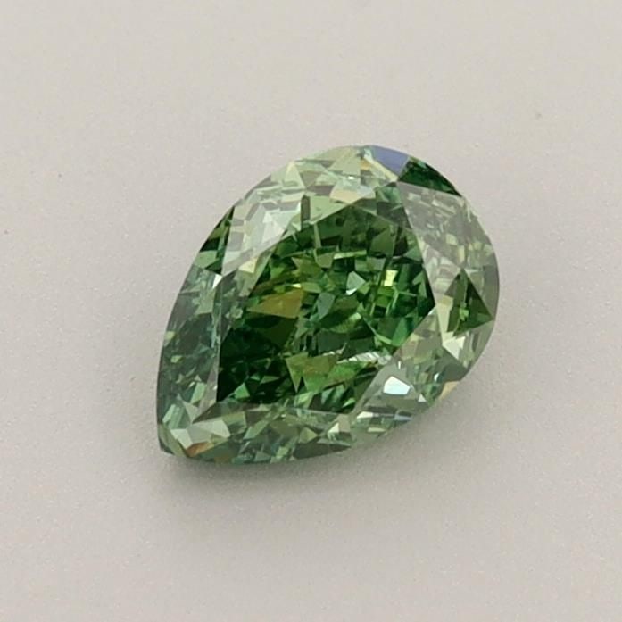 Loose Diamond - PEAR 0.64ct Fancy Vivid Green VS2: Loose Diamond - PEAR 0.64ct Fancy Vivid Green VS2 Source: This is a real non-mined Diamond that has been grown in a lab Shape: PEAR Carats: 0.64 Color: Fancy Vivid Green Certification: IGI Video: