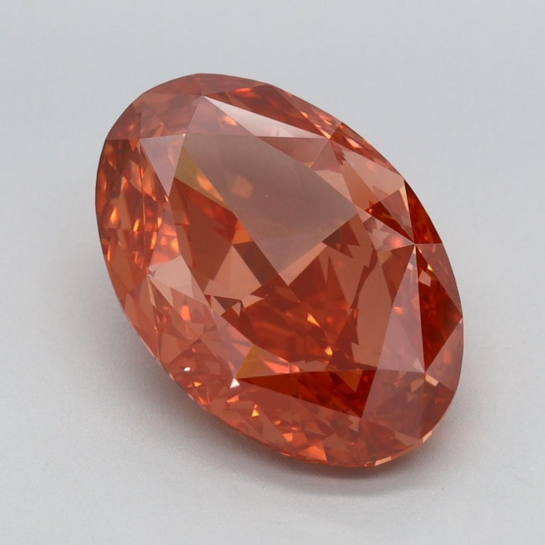 Loose Diamond - OVAL 4.45ct Fancy Vivid Orange Pink VVS2: Loose Diamond - OVAL 4.45ct Fancy Vivid Orange Pink VVS2 Source: This is a real non-mined Diamond that has been grown in a lab Shape: OVAL Carats: 4.45 Color: Fancy Vivid Orange Pink Certification: IG