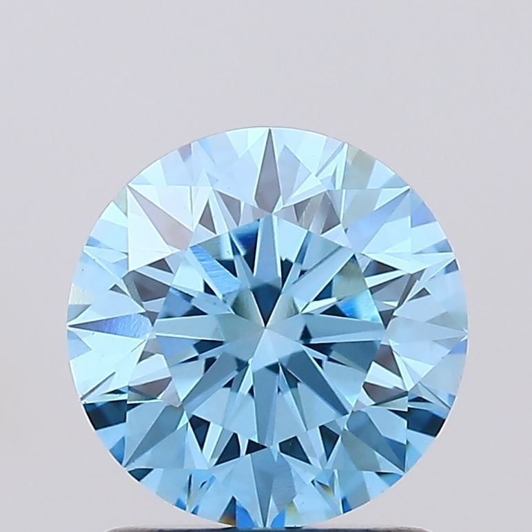 Ideal Loose Diamond - ROUND 1.29ct Fancy Vivid Blue VS1: Ideal Loose Diamond - ROUND 1.29ct Fancy Vivid Blue VS1 Source: This is a real non-mined Diamond that has been grown in a lab Shape: ROUND Carats: 1.29 Color: Fancy Vivid Blue Certification: IGI Video