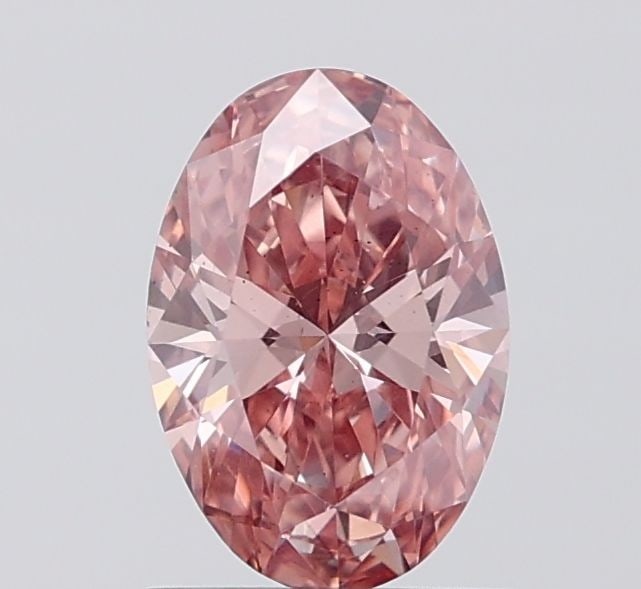 Loose Diamond - OVAL 1.06ct Fancy Vivid Brownish Pink VS2: Loose Diamond - OVAL 1.06ct Fancy Vivid Brownish Pink VS2 Source: This is a real non-mined Diamond that has been grown in a lab Shape: OVAL Carats: 1.06 Color: Fancy Vivid Brownish Pink Certification: