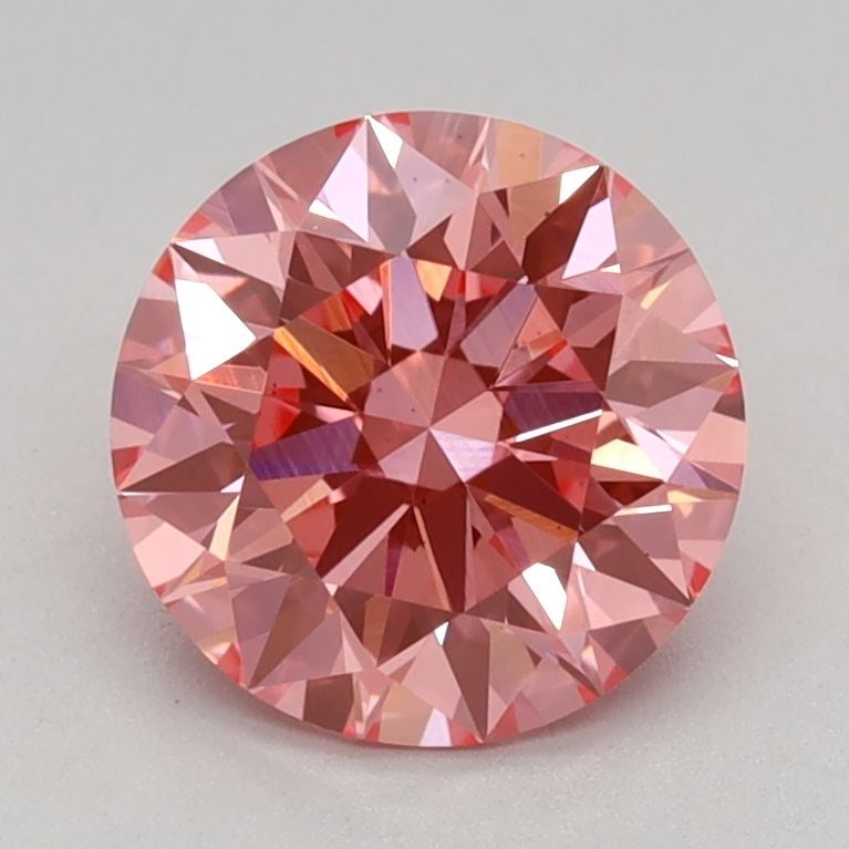 Ideal Loose Diamond - ROUND 1.18ct Fancy Vivid Pink VS1: Ideal Loose Diamond - ROUND 1.18ct Fancy Vivid Pink VS1 Source: This is a real non-mined Diamond that has been grown in a lab Shape: ROUND Carats: 1.18 Color: Fancy Vivid Pink Certification: IGI Video