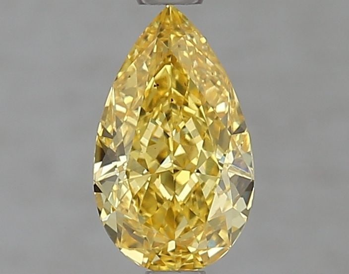 Loose Diamond - PEAR 1.13ct Fancy Vivid Yellow VS2: Loose Diamond - PEAR 1.13ct Fancy Vivid Yellow VS2 Source: This is a real non-mined Diamond that has been grown in a lab Shape: PEAR Carats: 1.13 Color: Fancy Vivid Yellow Certification: IGI Video:
