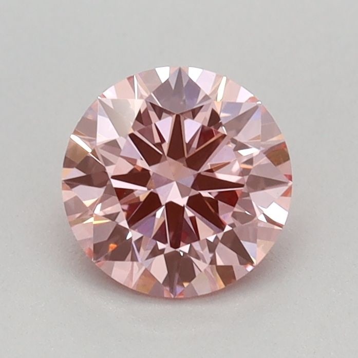 Ideal Loose Diamond - ROUND 0.56ct Fancy Vivid Pink VS1: Ideal Loose Diamond - ROUND 0.56ct Fancy Vivid Pink VS1 Source: This is a real non-mined Diamond that has been grown in a lab Shape: ROUND Carats: 0.56 Color: Fancy Vivid Pink Certification: IGI Video
