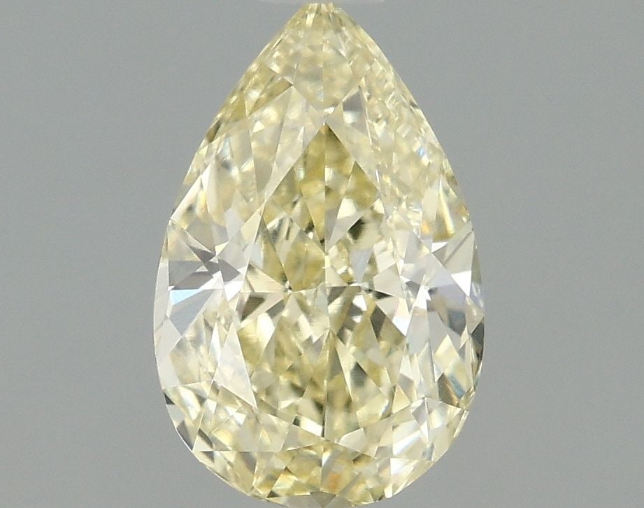 Loose Diamond - PEAR 1.01ct Fancy Yellow VS2: Loose Diamond - PEAR 1.01ct Fancy Yellow VS2 Source: This is a real non-mined Diamond that has been grown in a lab Shape: PEAR Carats: 1.01 Color: Fancy Yellow Certification: IGI Video: