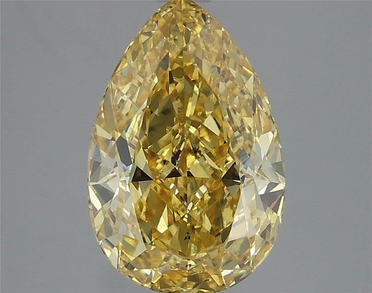 Loose Diamond - PEAR 3.1ct Fancy Vivid Yellow VS2: Loose Diamond - PEAR 3.1ct Fancy Vivid Yellow VS2 Source: This is a real non-mined Diamond that has been grown in a lab Shape: PEAR Carats: 3.1 Color: Fancy Vivid Yellow Certification: IGI Video: