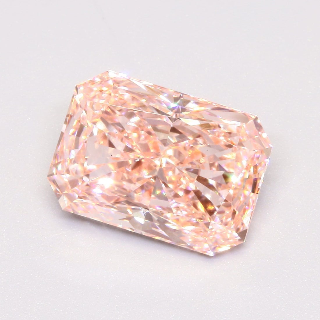 Loose Diamond - RADIANT 3.02ct Fancy Vivid Pink VS1: Loose Diamond - RADIANT 3.02ct Fancy Vivid Pink VS1 Source: This is a real non-mined Diamond that has been grown in a lab Shape: RADIANT Carats: 3.02 Color: Fancy Vivid Pink Certification: IGI Video: