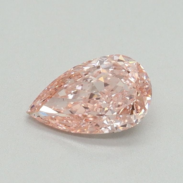 Loose Diamond - PEAR 0.6ct Fancy Vivid Pink VS2: Loose Diamond - PEAR 0.6ct Fancy Vivid Pink VS2 Source: This is a real non-mined Diamond that has been grown in a lab Shape: PEAR Carats: 0.6 Color: Fancy Vivid Pink Certification: IGI Video: