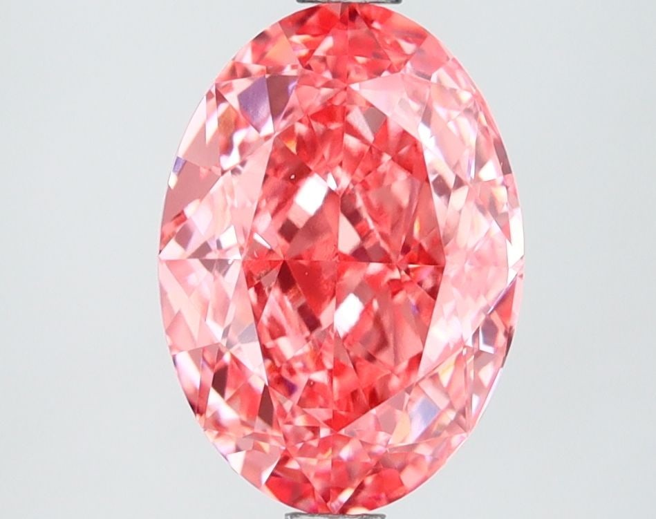 Loose Diamond - OVAL 2.64ct Fancy Vivid Pink VVS2: Loose Diamond - OVAL 2.64ct Fancy Vivid Pink VVS2 Source: This is a real non-mined Diamond that has been grown in a lab Shape: OVAL Carats: 2.64 Color: Fancy Vivid Pink Certification: IGI Video: