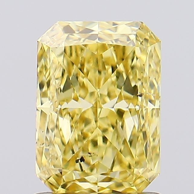 Loose Diamond - RADIANT 1.23ct Fancy Vivid Yellow VS2: Loose Diamond - RADIANT 1.23ct Fancy Vivid Yellow VS2 Source: This is a real non-mined Diamond that has been grown in a lab Shape: RADIANT Carats: 1.23 Color: Fancy Vivid Yellow Certification: IGI Vid