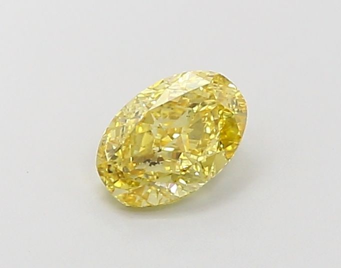 Loose Diamond - OVAL 1.09ct Fancy Vivid Yellow VS2: Loose Diamond - OVAL 1.09ct Fancy Vivid Yellow VS2 Source: This is a real non-mined Diamond that has been grown in a lab Shape: OVAL Carats: 1.09 Color: Fancy Vivid Yellow Certification: IGI Video: