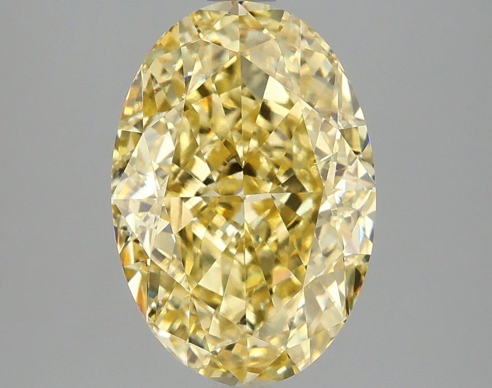 Loose Diamond - OVAL 4.08ct Fancy Vivid Yellow VS2: Loose Diamond - OVAL 4.08ct Fancy Vivid Yellow VS2 Source: This is a real non-mined Diamond that has been grown in a lab Shape: OVAL Carats: 4.08 Color: Fancy Vivid Yellow Certification: IGI Video:
