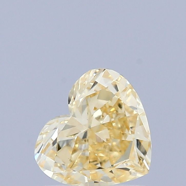 Loose Diamond - HEART 0.59ct Fancy Yellow VVS2: Loose Diamond - HEART 0.59ct Fancy Yellow VVS2 Source: This is a real non-mined Diamond that has been grown in a lab Shape: HEART Carats: 0.59 Color: Fancy Yellow Certification: IGI Video: