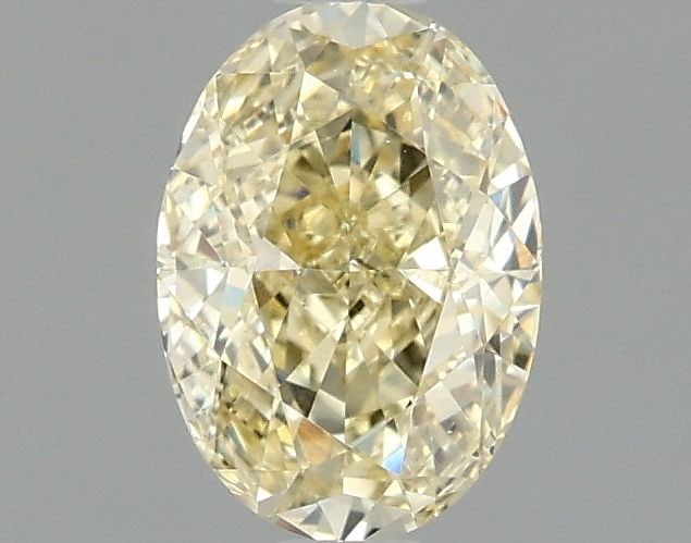 Loose Diamond - OVAL 1.08ct Fancy Yellow VS2: Loose Diamond - OVAL 1.08ct Fancy Yellow VS2 Source: This is a real non-mined Diamond that has been grown in a lab Shape: OVAL Carats: 1.08 Color: Fancy Yellow Certification: IGI Video: