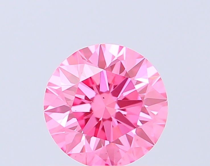 Ideal Loose Diamond - ROUND 0.5ct Fancy Vivid Pink VS2: Ideal Loose Diamond - ROUND 0.5ct Fancy Vivid Pink VS2 Source: This is a real non-mined Diamond that has been grown in a lab Shape: ROUND Carats: 0.5 Color: Fancy Vivid Pink Certification: IGI Video: