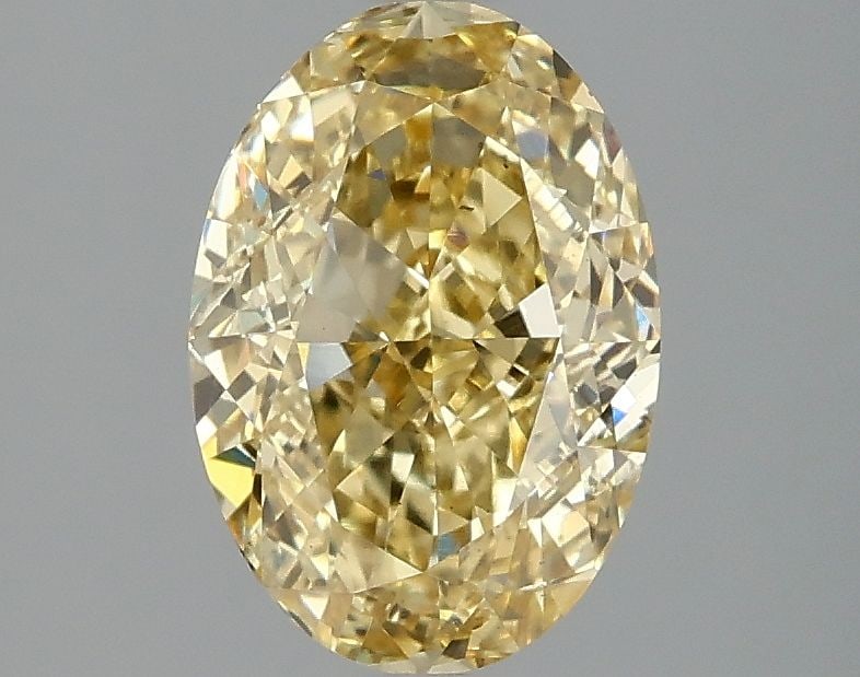 Loose Diamond - OVAL 2.0ct Fancy Vivid Yellow VS2: Loose Diamond - OVAL 2.0ct Fancy Vivid Yellow VS2 Source: This is a real non-mined Diamond that has been grown in a lab Shape: OVAL Carats: 2.0 Color: Fancy Vivid Yellow Certification: IGI Video: