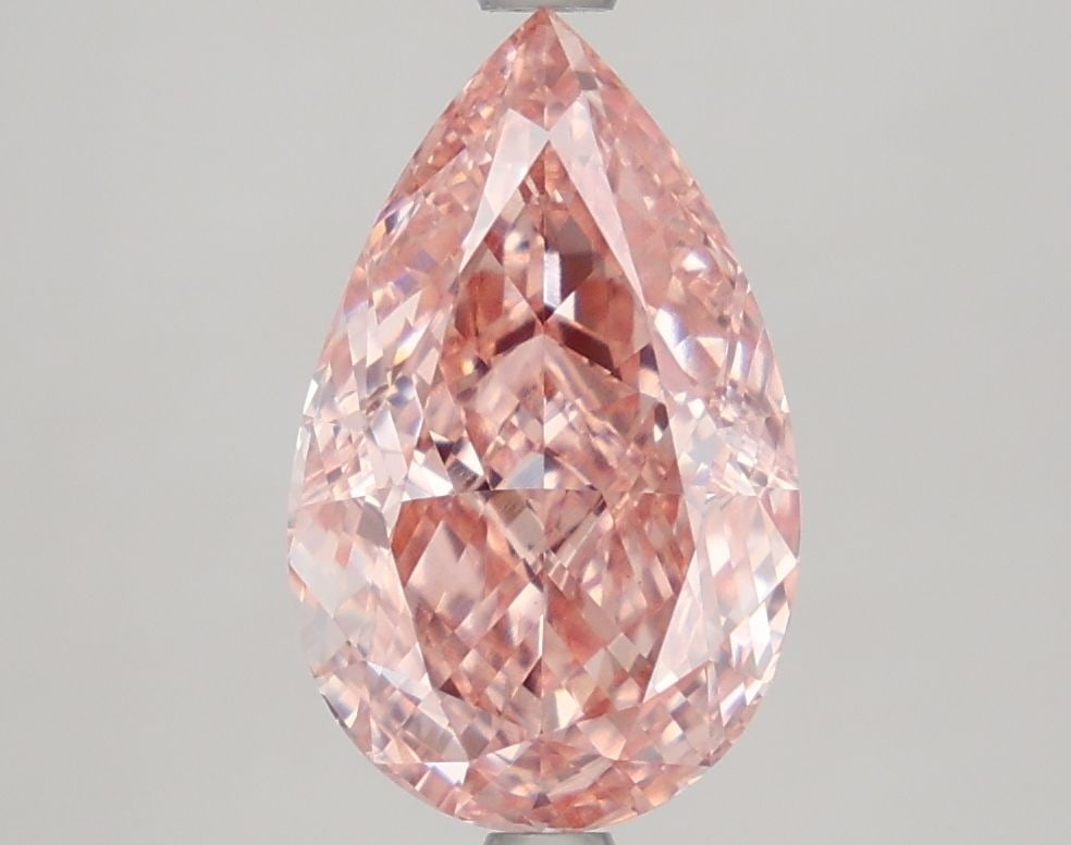 Loose Diamond - PEAR 3.04ct Fancy Vivid Pink VVS2: Loose Diamond - PEAR 3.04ct Fancy Vivid Pink VVS2 Source: This is a real non-mined Diamond that has been grown in a lab Shape: PEAR Carats: 3.04 Color: Fancy Vivid Pink Certification: IGI Video: