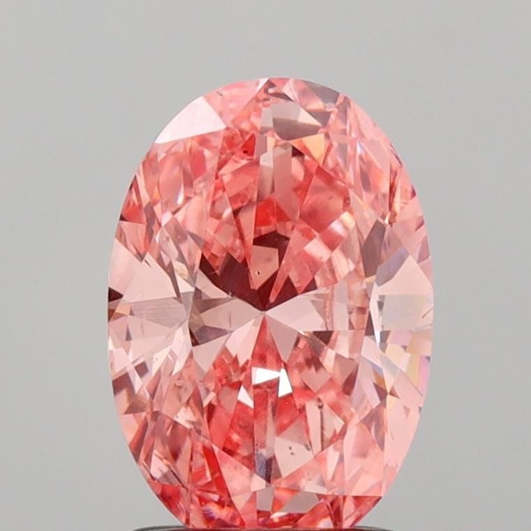 Loose Diamond - OVAL 1.44ct Fancy Vivid Pink VS2: Loose Diamond - OVAL 1.44ct Fancy Vivid Pink VS2 Source: This is a real non-mined Diamond that has been grown in a lab Shape: OVAL Carats: 1.44 Color: Fancy Vivid Pink Certification: IGI Video: