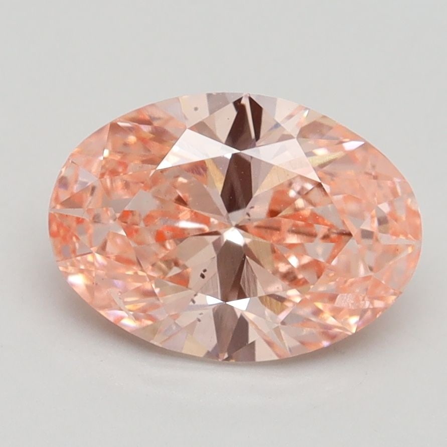 Loose Diamond - OVAL 2.0ct Fancy Vivid Orangey Pink SI2: Loose Diamond - OVAL 2.0ct Fancy Vivid Orangey Pink SI2 Source: This is a real non-mined Diamond that has been grown in a lab Shape: OVAL Carats: 2.0 Color: Fancy Vivid Orangey Pink Certification: IGI