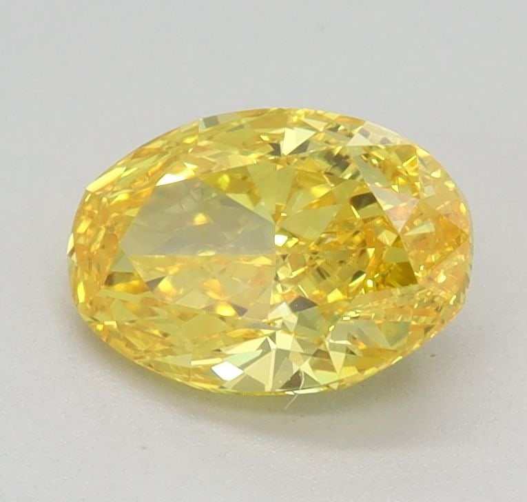 Loose Diamond - OVAL 0.89ct Fancy Vivid Yellow VS1: Loose Diamond - OVAL 0.89ct Fancy Vivid Yellow VS1 Source: This is a real non-mined Diamond that has been grown in a lab Shape: OVAL Carats: 0.89 Color: Fancy Vivid Yellow Certification: IGI Video: