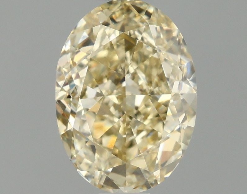 Loose Diamond - OVAL 1.01ct Fancy Yellow VS1: Loose Diamond - OVAL 1.01ct Fancy Yellow VS1 Source: This is a real non-mined Diamond that has been grown in a lab Shape: OVAL Carats: 1.01 Color: Fancy Yellow Certification: IGI Video: