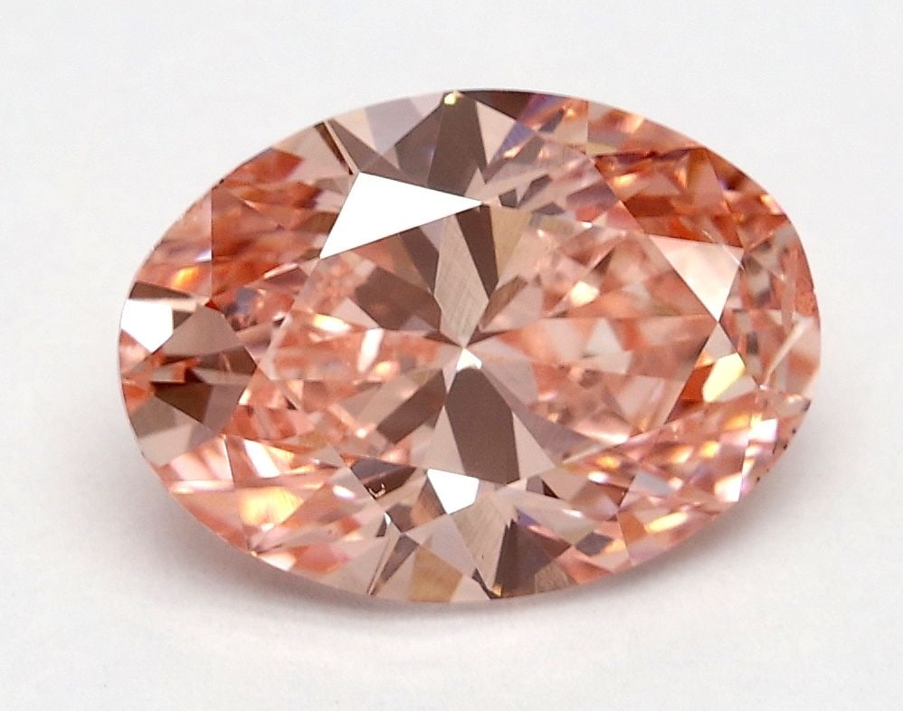 Loose Diamond - OVAL 1.8ct Fancy Vivid Pink SI1: Loose Diamond - OVAL 1.8ct Fancy Vivid Pink SI1 Source: This is a real non-mined Diamond that has been grown in a lab Shape: OVAL Carats: 1.8 Color: Fancy Vivid Pink Certification: IGI Video: