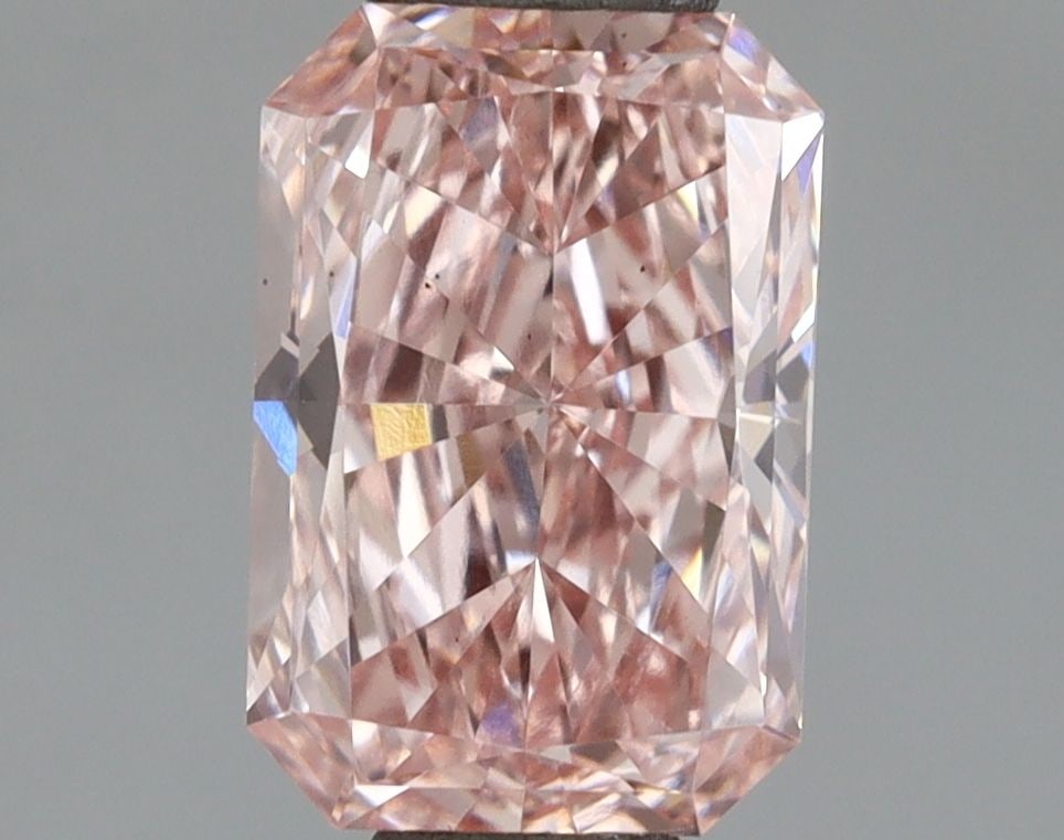 Loose Diamond - RADIANT 0.92ct Fancy Vivid Pink VS1: Loose Diamond - RADIANT 0.92ct Fancy Vivid Pink VS1 Source: This is a real non-mined Diamond that has been grown in a lab Shape: RADIANT Carats: 0.92 Color: Fancy Vivid Pink Certification: IGI Video: