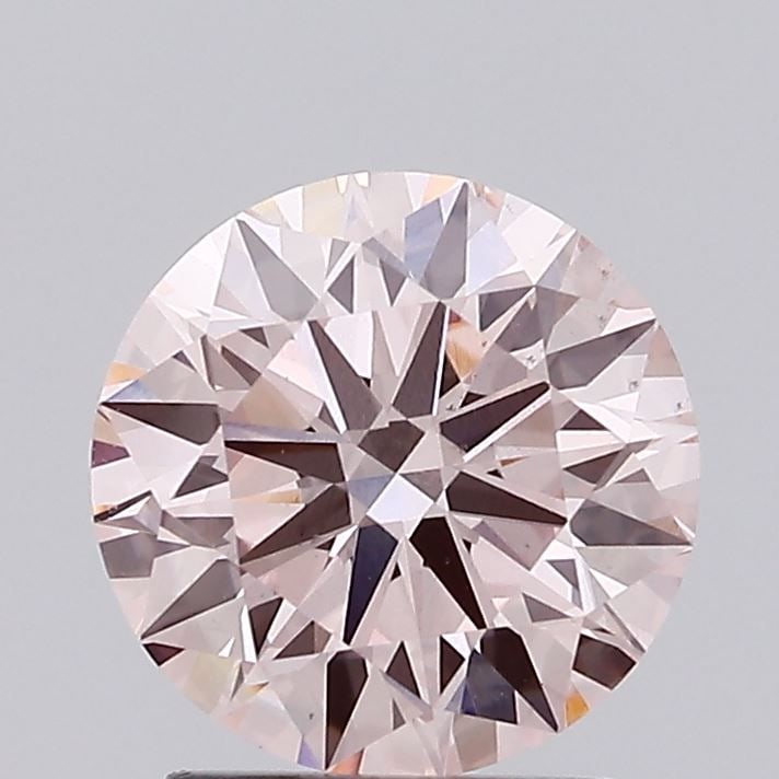 Ideal Loose Diamond - ROUND 2.01ct Fancy Pink VS2: Ideal Loose Diamond - ROUND 2.01ct Fancy Pink VS2 Source: This is a real non-mined Diamond that has been grown in a lab Shape: ROUND Carats: 2.01 Color: Fancy Pink Certification: IGI Video: