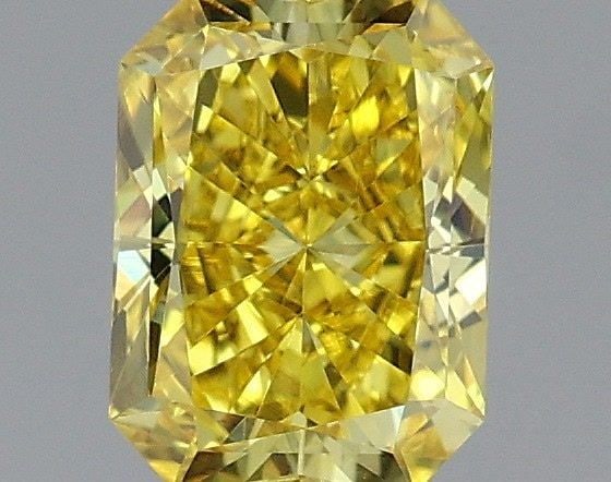 Loose Diamond - RADIANT 0.54ct Fancy Vivid Yellow VVS2: Loose Diamond - RADIANT 0.54ct Fancy Vivid Yellow VVS2 Source: This is a real non-mined Diamond that has been grown in a lab Shape: RADIANT Carats: 0.54 Color: Fancy Vivid Yellow Certification: IGI Vi