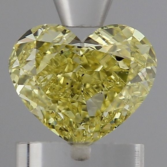 Loose Diamond - HEART 1.03ct Fancy Vivid Yellow SI1: Loose Diamond - HEART 1.03ct Fancy Vivid Yellow SI1 Source: This is a real non-mined Diamond that has been grown in a lab Shape: HEART Carats: 1.03 Color: Fancy Vivid Yellow Certification: IGI Video: