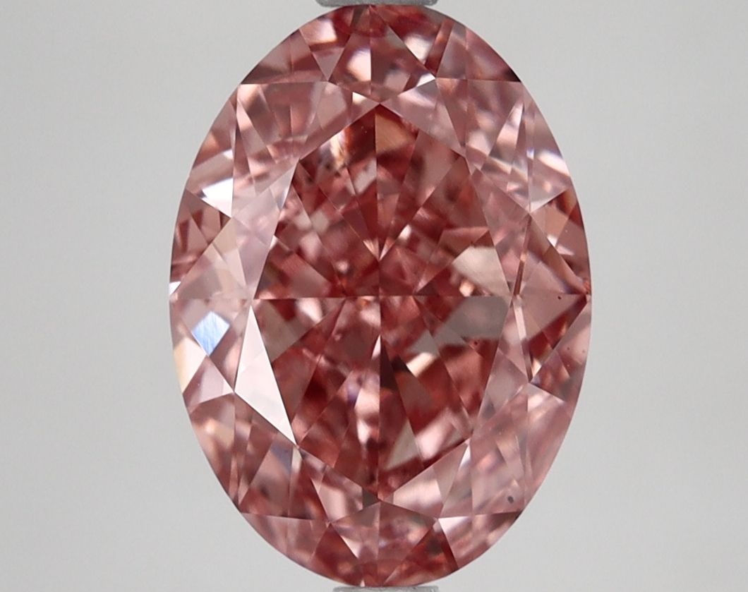 Loose Diamond - OVAL 4.04ct Fancy Vivid Pink VS1: Loose Diamond - OVAL 4.04ct Fancy Vivid Pink VS1 Source: This is a real non-mined Diamond that has been grown in a lab Shape: OVAL Carats: 4.04 Color: Fancy Vivid Pink Certification: IGI Video: