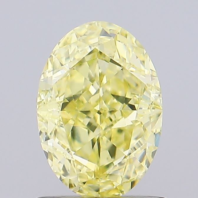 Loose Diamond - OVAL 1.2ct Fancy Yellow VS1: Loose Diamond - OVAL 1.2ct Fancy Yellow VS1 Source: This is a real non-mined Diamond that has been grown in a lab Shape: OVAL Carats: 1.2 Color: Fancy Yellow Certification: IGI Video: