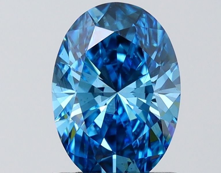 Loose Diamond - OVAL 1.56ct Fancy Vivid Blue VS2: Loose Diamond - OVAL 1.56ct Fancy Vivid Blue VS2 Source: This is a real non-mined Diamond that has been grown in a lab Shape: OVAL Carats: 1.56 Color: Fancy Vivid Blue Certification: IGI Video: