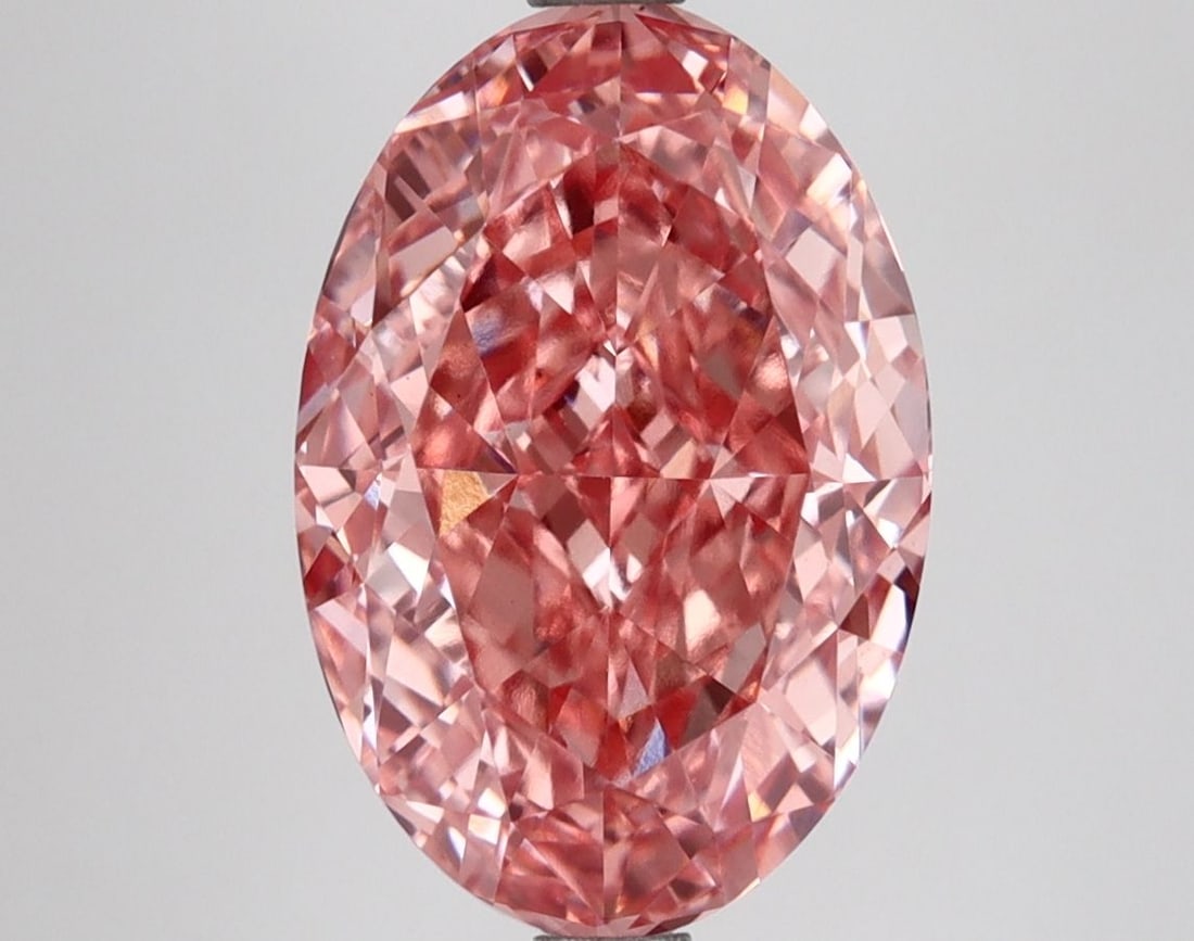 Loose Diamond - OVAL 4.51ct Fancy Vivid Pink VS1: Loose Diamond - OVAL 4.51ct Fancy Vivid Pink VS1 Source: This is a real non-mined Diamond that has been grown in a lab Shape: OVAL Carats: 4.51 Color: Fancy Vivid Pink Certification: IGI Video: