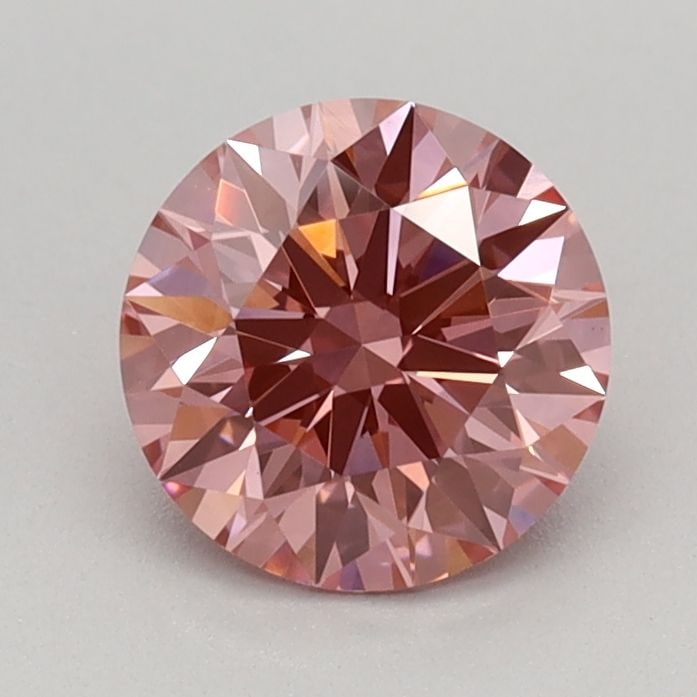 Ideal Loose Diamond - ROUND 0.78ct Fancy Vivid Pink VVS2: Ideal Loose Diamond - ROUND 0.78ct Fancy Vivid Pink VVS2 Source: This is a real non-mined Diamond that has been grown in a lab Shape: ROUND Carats: 0.78 Color: Fancy Vivid Pink Certification: IGI Vide