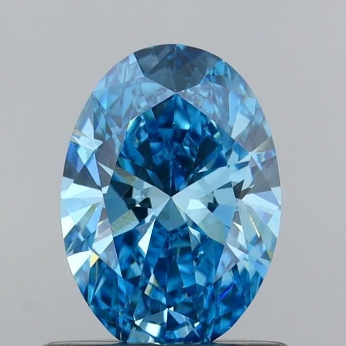 Loose Diamond - OVAL 0.73ct Fancy Vivid Blue VS1: Loose Diamond - OVAL 0.73ct Fancy Vivid Blue VS1 Source: This is a real non-mined Diamond that has been grown in a lab Shape: OVAL Carats: 0.73 Color: Fancy Vivid Blue Certification: IGI Video: