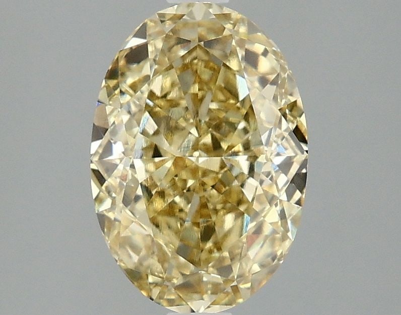 Loose Diamond - OVAL 2.07ct Fancy Intense Yellow VVS2: Loose Diamond - OVAL 2.07ct Fancy Intense Yellow VVS2 Source: This is a real non-mined Diamond that has been grown in a lab Shape: OVAL Carats: 2.07 Color: Fancy Intense Yellow Certification: IGI Vide
